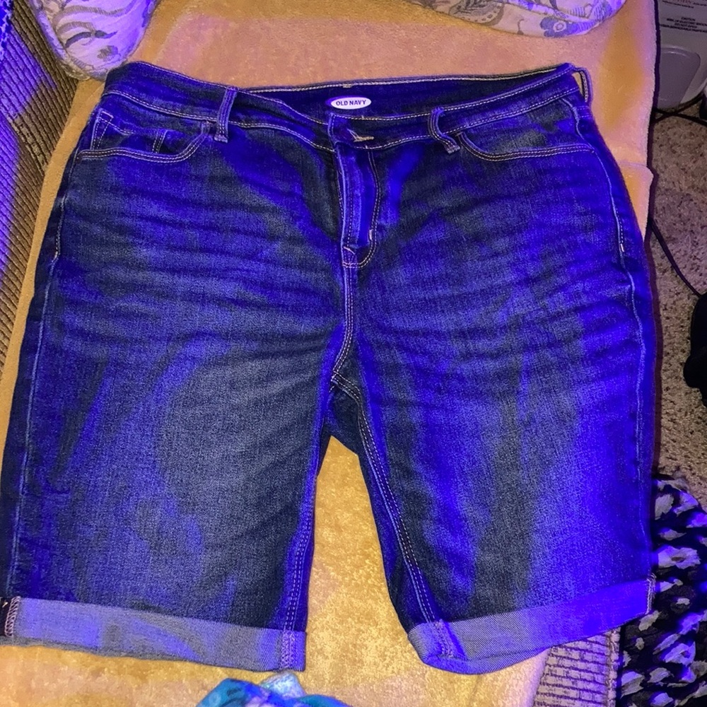 Old navy blue Jean shorts with bottom cuff.